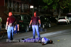 An unidentified man delivering food to a local household in Canarsie, Brooklyn, was struck on his motorized bike by a BMW driver as he rode down East 84th Street near Flatlands Avenue Tuesday night. He man was left unconscious after suffering a head injury. He was rushed to Brookdale Hospital in critical condition. The driver remained on the scene as police investigated the crash. (Photos by Todd Maisel)
