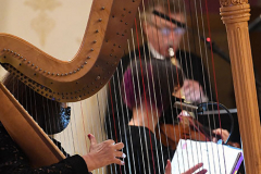 UND Eve of Remembrance Ceremony
Our Lady of Pity Church
Staten Island, NY
Photographs by:  Mary DiBiase Blaich

The 20th Annual Solemn Remembrance of 9/11 was held at the Church of Our Lady of Pity on Friday, September 10, 2021.  The evening is sponsored by University of Notre Dame  Alumni Club of Staten Island.  The evening began with 30 minutes of music by the Maura Molloy Group.  A con celebrated Mass began at 7:30, and Bishop John O’Hara was the main celebrant and homilist.  Many priests and deacons attended the event. 
 An honor guard was provided by the Knights of Columbus, and the Holy Name Society of St Anthony of Padua marched in and sat as a group.  
All the names of the Staten Island victims on 9/11 and the additional victims of 9/11 related illness were read by members of the club and students from the Island’s Catholic High Schools.  The number of victims is over 330.  
Shortly before the conclusion of the Mass,   Staten Island Pipes and Drums played “Amazing Grace” as the church was turned into darkness, with just the Altar candles burning.  
Following the service, the pipers and drummers performed more selections in the parking lot next to the parish hall.