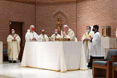 UND Eve of Remembrance Ceremony
Our Lady of Pity Church
Staten Island, NY
Photographs by:  Mary DiBiase Blaich

The 20th Annual Solemn Remembrance of 9/11 was held at the Church of Our Lady of Pity on Friday, September 10, 2021.  The evening is sponsored by University of Notre Dame  Alumni Club of Staten Island.  The evening began with 30 minutes of music by the Maura Molloy Group.  A con celebrated Mass began at 7:30, and Bishop John O’Hara was the main celebrant and homilist.  Many priests and deacons attended the event. 
 An honor guard was provided by the Knights of Columbus, and the Holy Name Society of St Anthony of Padua marched in and sat as a group.  
All the names of the Staten Island victims on 9/11 and the additional victims of 9/11 related illness were read by members of the club and students from the Island’s Catholic High Schools.  The number of victims is over 330.  
Shortly before the conclusion of the Mass,   Staten Island Pipes and Drums played “Amazing Grace” as the church was turned into darkness, with just the Altar candles burning.  
Following the service, the pipers and drummers performed more selections in the parking lot next to the parish hall.