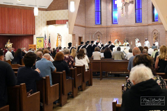 UND Eve of Remembrance Ceremony
Our Lady of Pity Church
Staten Island, NY
Photographs by:  Mary DiBiase Blaich

The 20th Annual Solemn Remembrance of 9/11 was held at the Church of Our Lady of Pity on Friday, September 10, 2021.  The evening is sponsored by University of Notre Dame  Alumni Club of Staten Island.  The evening began with 30 minutes of music by the Maura Molloy Group.  A con celebrated Mass began at 7:30, and Bishop John O’Hara was the main celebrant and homilist.  Many priests and deacons attended the event. 
 An honor guard was provided by the Knights of Columbus, and the Holy Name Society of St Anthony of Padua marched in and sat as a group.  
All the names of the Staten Island victims on 9/11 and the additional victims of 9/11 related illness were read by members of the club and students from the Island’s Catholic High Schools.  The number of victims is over 330.  
Shortly before the conclusion of the Mass,   Staten Island Pipes and Drums played “Amazing Grace” as the church was turned into darkness, with just the Altar candles burning.  
Following the service, the pipers and drummers performed more selections in the parking lot next to the parish hall.