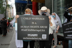 New York,   N.Y.. –Unchained At Last and advocates dressed in bridal gowns and veils, with arms chained and mouths taped, gathered in Manhattan outside Gov. Cuomo’s office to celebrate that New York just became the sixth state to end child marriage.