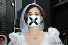 New York,   N.Y.. –Unchained At Last and advocates dressed in bridal gowns and veils, with arms chained and mouths taped, gathered in Manhattan outside Gov. Cuomo’s office to celebrate that New York just became the sixth state to end child marriage.