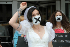New York,   N.Y.. –Unchained At Last and advocates dressed in bridal gowns and veils, with arms chained and mouths taped, gathered in Manhattan outside Gov. Cuomo’s office to celebrate that New York just became the sixth state to end child marriage.