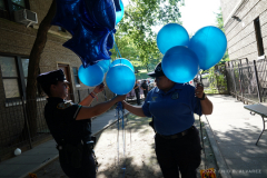 NYPD place blue balloons in front of building where slain Transit officer Adrianna Reyes-Gomez was killed. Bronx residents, NYPD officials and Bronx elected officials hold a Candlelight Vigil in honor and in memory of NYPD Transit Officer Adrianna Reyes-Gomez who was brutally murdered in her Bronx apartment at 780 Grand Concourse, Bronx, New York 10451 on Wednesday, June 15, 2022

Photography by Enid B. Alvarez