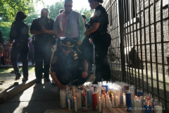NYPD officer places a candle down for her sister, slain Transit Officer Adrianna Reyes-Gomez along with Bronx residents, NYPD officials and Bronx elected officials hold a Candlelight Vigil in honor and in memory of NYPD Transit Officer Adrianna Reyes-Gomez who was brutally murdered in her Bronx apartment at 780 Grand Concourse, Bronx, New York 10451 on Wednesday, June 15, 2022

Photography by Enid B. Alvarez