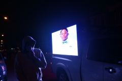 A truck drives by with Walter Wallaces picture following the killing of Wallace in west Philly.