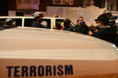 Police and Protestors crash in West Philly following a fatal polic involved shooting. (Photo by Lloyd Mitchell