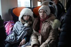 Refugees including Kristy (L) aboard a train at Przemysl station, six days after the start of Russia’s attacks on Ukraine, March 1, 2022 in Przemysl, Poland. Przemysl station has become a safe haven for thousands of people fleeing the war that Russia launched against Ukraine on February 24