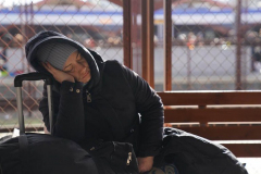 A woman sleeps on her luggage at Przemysl station, six days after the start of Russia’s attacks on Ukraine, March 1, 2022 in Przemysl, Poland. Przemysl station has become a safe haven for thousands of people fleeing the war that Russia launched against Ukraine on February 24.
