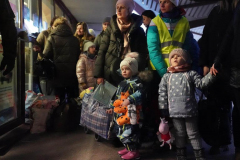 Women and children wait at customs clearance after making a 32 hour train ride from Kyiv to Przemysl station after crossing the border from Ukraine on March 2, 2022