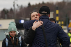 Refugees walk across the border from Ukraine on March 2, 2022 in Medyka, Poland. Poland has received nearly 300,000 refugees from Ukraine since Russia invaded on February 24