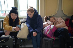 Ukrainian refugees wait for a train at Przemysl station in Poland on March 3, 2022.