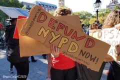 Mass march to defund the New York City Police Department, Tax the rich, and stop the layoffs held at Washington Square Park in New York's Greenwich Village.