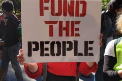 Mass march to defund the New York City Police Department, Tax the rich, and stop the layoffs held at Washington Square Park in New York's Greenwich Village.