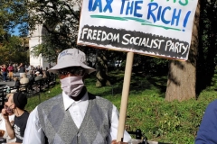 Mass march to defund the New York City Police Department, Tax the rich, and stop the layoffs held at Washington Square Park in New York's Greenwich Village.