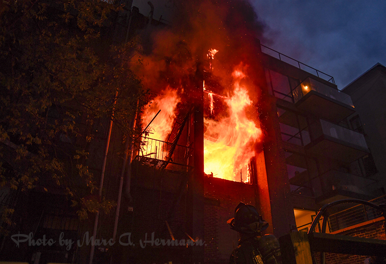 A five-alarm fire tore through 132 Montague St. near Henry St., Brooklyn Heights