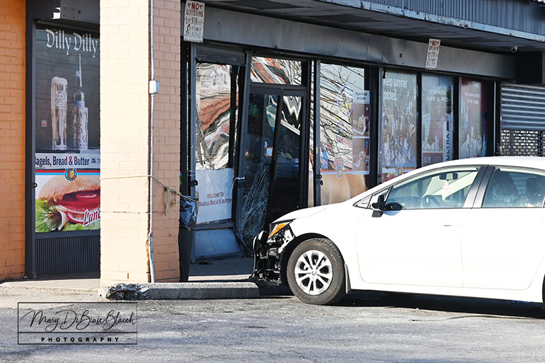 Car Into Store